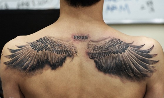 浦东纹身,由龙刺青_黑色翅膀